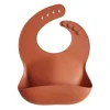 Outlet silikoninen ruokalappu (clay) Ruokailuhetkiin