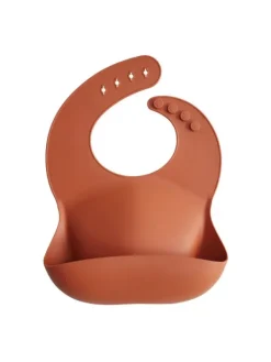 Outlet silikoninen ruokalappu (clay) Ruokailuhetkiin